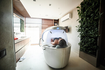 Modern capsule for hydrotherapy in a beauty salon for women
 - obrazy, fototapety, plakaty
