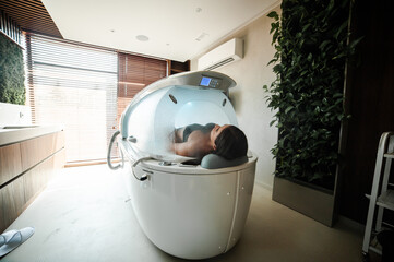 Modern capsule for hydrotherapy in a beauty salon for women
 - obrazy, fototapety, plakaty