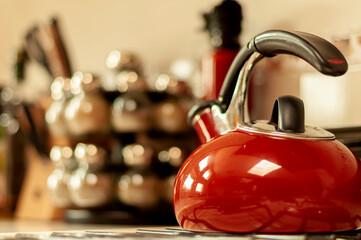 Red kettle in a kitchen