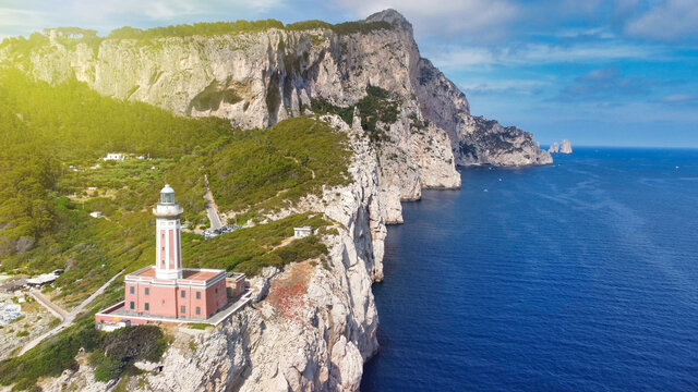 Amazing aerial view of Capri coastline along the lighthouse in summer season.