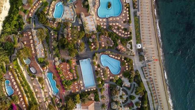 Overhead Aerial View Of Ischia Citara Beach At Sunset With Pools And Sand.