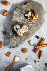 Different selection of dessert balls served on a rock