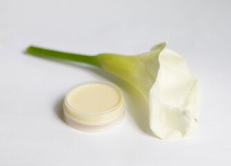 Obraz na płótnie Canvas Cream in a jar on a white background