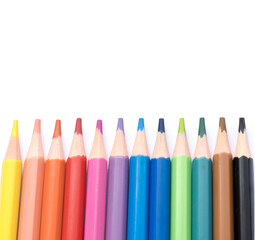 Colored pencils on a white background.