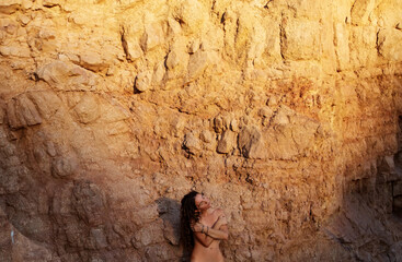 Naked woman in the desert