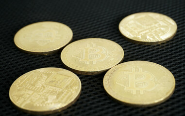 bitcoin on black background with selective focus