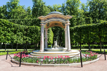 Gazebo (Pink Fountain) with a sculptural group "Amur with a swan" in the center. Palace and Park ensemble Arkhangengelskoye. Moscow Region, Russia