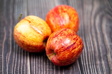red apple on a wooden background