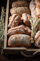 Baguettes and buns baked in bakery. Country kitchen or bakery.