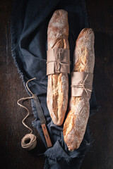 Brown baguettes for healthy breakfast. Baguettes from the bakery.