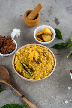 Famous Indian recipe khichdi or food with dal or lentins and rice. Selective focus.