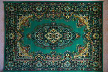 Vintage ornamented carpet on the wall