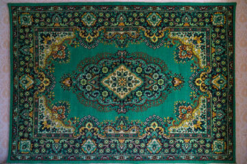 Vintage ornamented carpet on the wall