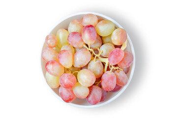 Grape. Ripe berries in a white plate. Isolated on white