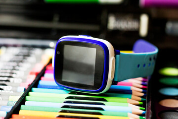 Children's smart watches and a set of markers, a navigator for a schoolboy