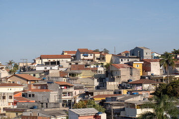 houses on the outskirts of São Paulo with blue sky.