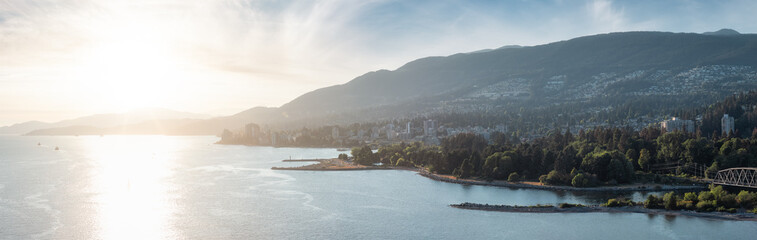 Fototapeta premium West Vancouver, British Columbia, Canada. Aerial Panoramic View of a modern cityscape on the Pacific Ocean Coast. Summer sunny Sunset Sky Art Render.