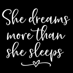 she dreams more than she sleeps on black background inspirational quotes,lettering design