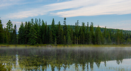 Mist on a great lake in Quebec, Canada in the morning