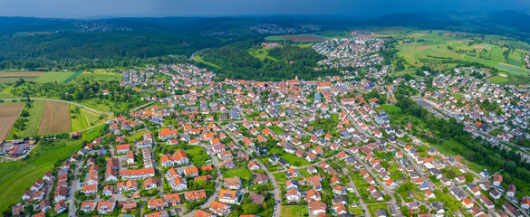 Aerial view of the city Rechberghausen in Germany, on a cloudy day in Spring