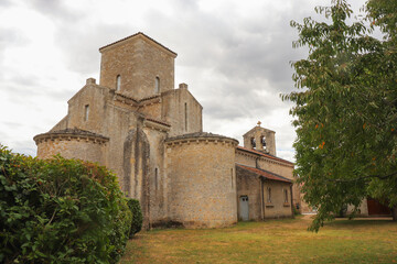Fototapeta na wymiar Loiret - Germigny-les-Prés - Eglise de la Très Sainte Trinité avec sa croix et ses cloches