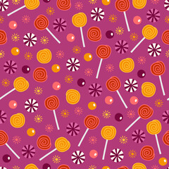 Fototapeta premium Halloween seamless pattern with candies and lollipops on purple background