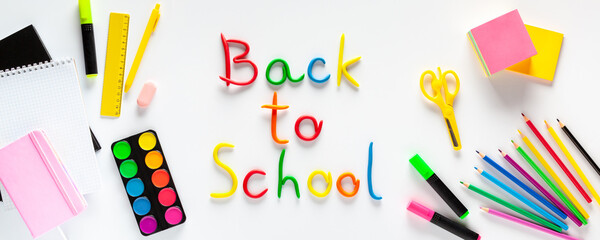 Stationery on white background, flat lay. Back to school concept. Banner