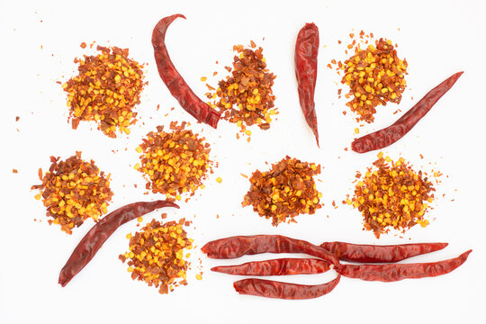 Dried Red Pepper Flakes Isolated On White, Top View
