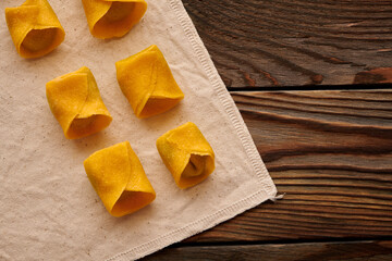 Raw homemade ravioli pasta with spinach and ricotta
