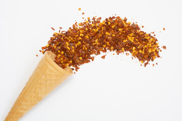 dried red pepper flakes isolated on white, top view
