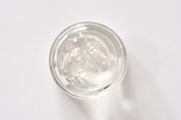 Aloe vera gel in a cosmetic jar on white background. Healthy cosmetic product.