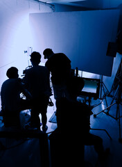Video production behind the scenes. Making of TV commercial movie that film crew team lightman and...
