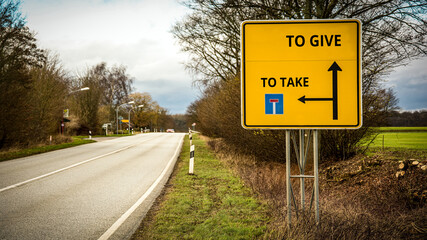 Street Sign to TO GIVE versus TO TAKE