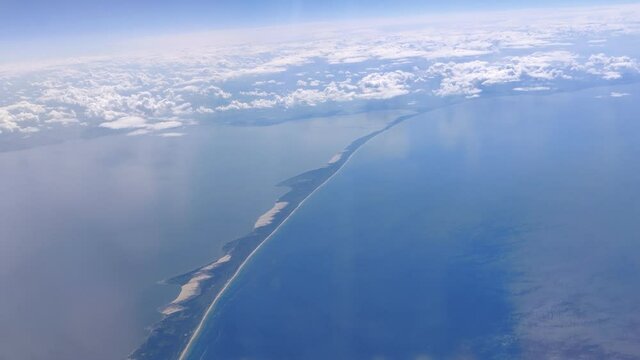 View from Airplane window while flying over Neringa peninsula