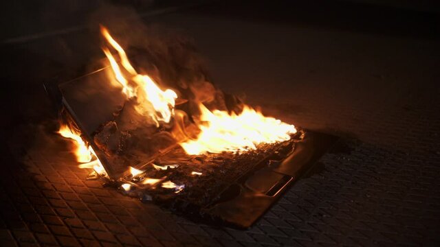 Laptop keyboard on fire and melting