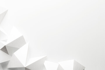 White triangular shapes made paper, abstract background