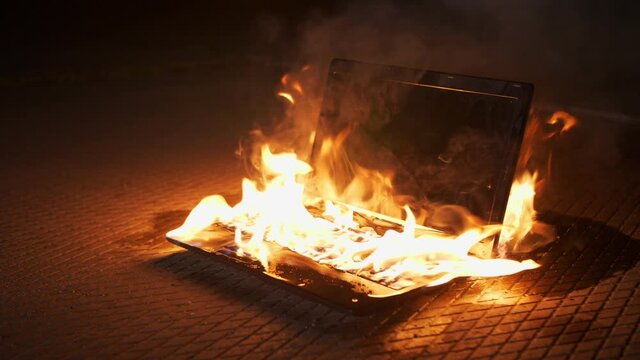 Laptop keyboard on fire and melting