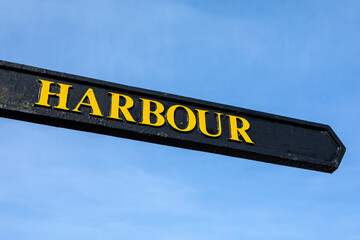 Sign for Polperro Harbour in Cornwall, UK