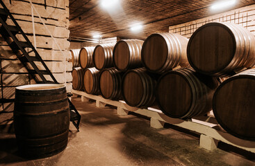 Wooden wine barrels in the basement