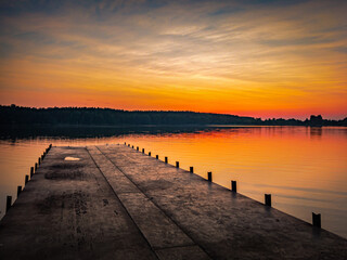 Fototapeta na wymiar Sunset at lake, sky with clouds
