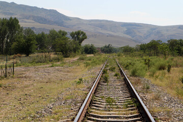 old railway railroad tracks in the mountains