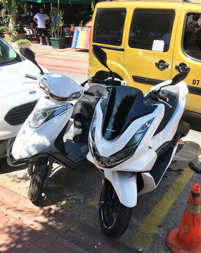 Turkey, Kemer 20.07.2021:A Honda PCX 150 motorcycle is parked in the city of Alanya. 