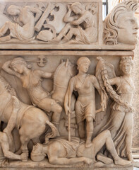 Fototapeta na wymiar Ancient roman battle scene carved on a marble monument