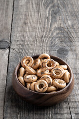 Bowl full of small traditional russian bread rings on wooden table