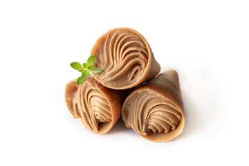 mini cone cake with whipped cream and toffee isolated on white