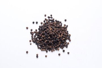 Black pepper, Piper nigrum, flatlay shot against white background