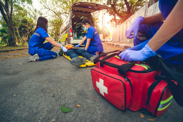 Emergency accident patient Suffered on head lying on stretcher. First aid training and move patient...