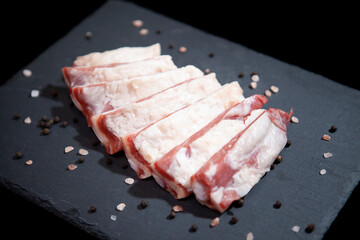 fresh raw meat presentation on granite