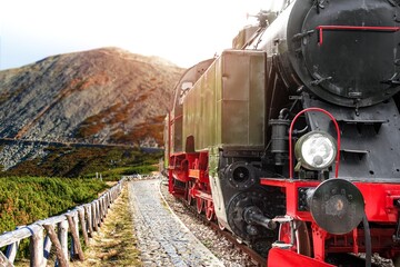 Old locomotive on the rural railway