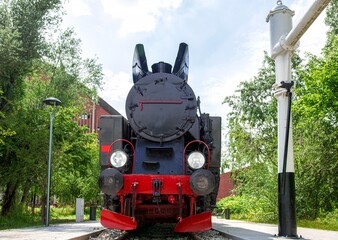Old locomotive on the rural railway